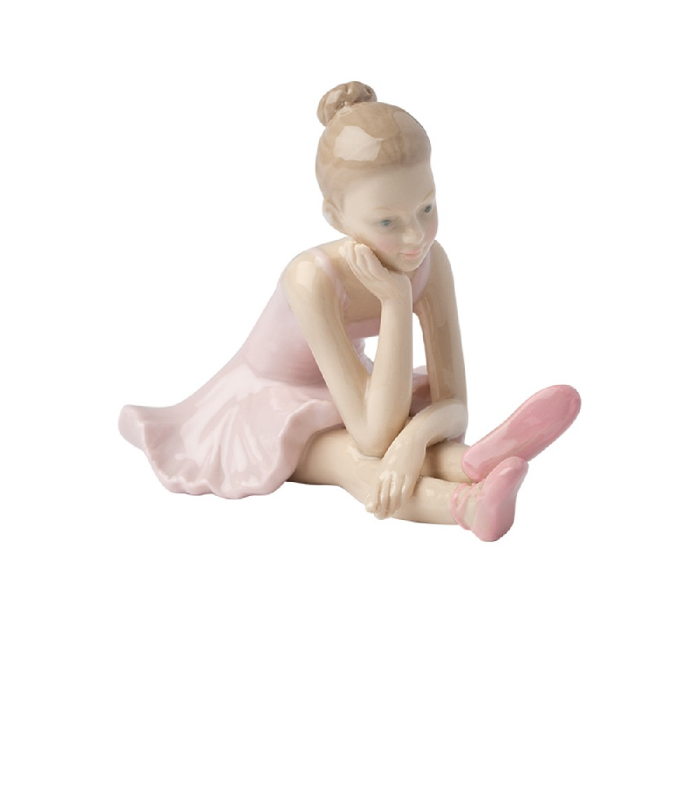 Ballerina seduta