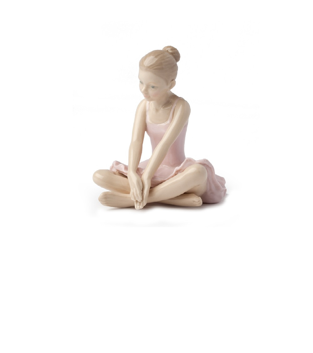 Ballerina seduta